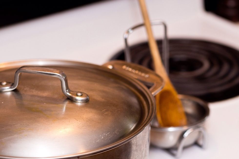 Now it's time to put the lid on and clean the kitchen.  We also started getting our pancakes ready while it was cooking. Stir it every 5 minutes or so and add a bit of water if it gets to dry.
