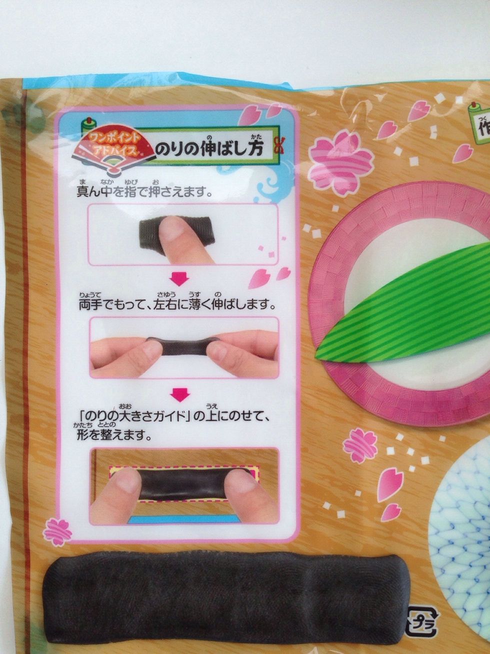 Now its time to Make Your Nori Seaweed for your Sushi Roll-Use the Guide on the Placemat that you cut earlier from Packaging to Roll it out in a long rectangle