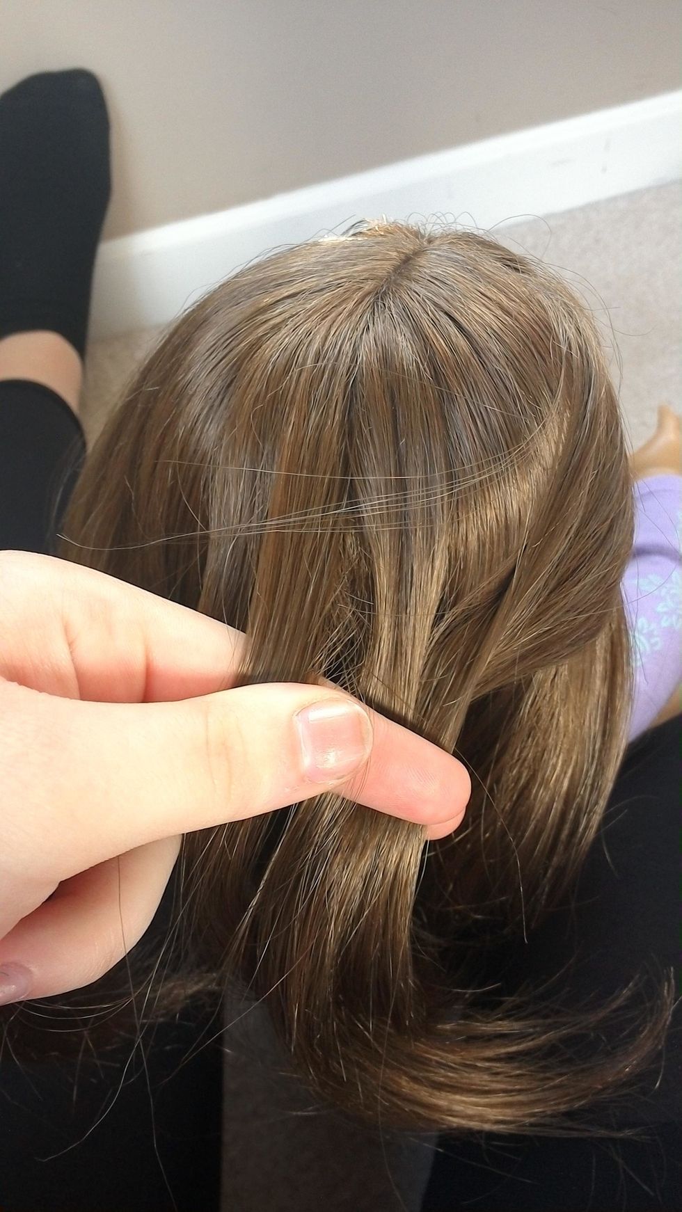 Now join it with the small section of hair farthest to the right.