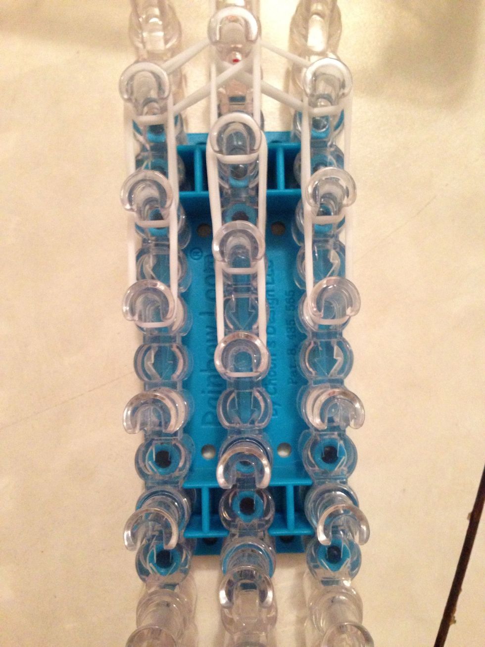 Now just add two more in the middle peg like so