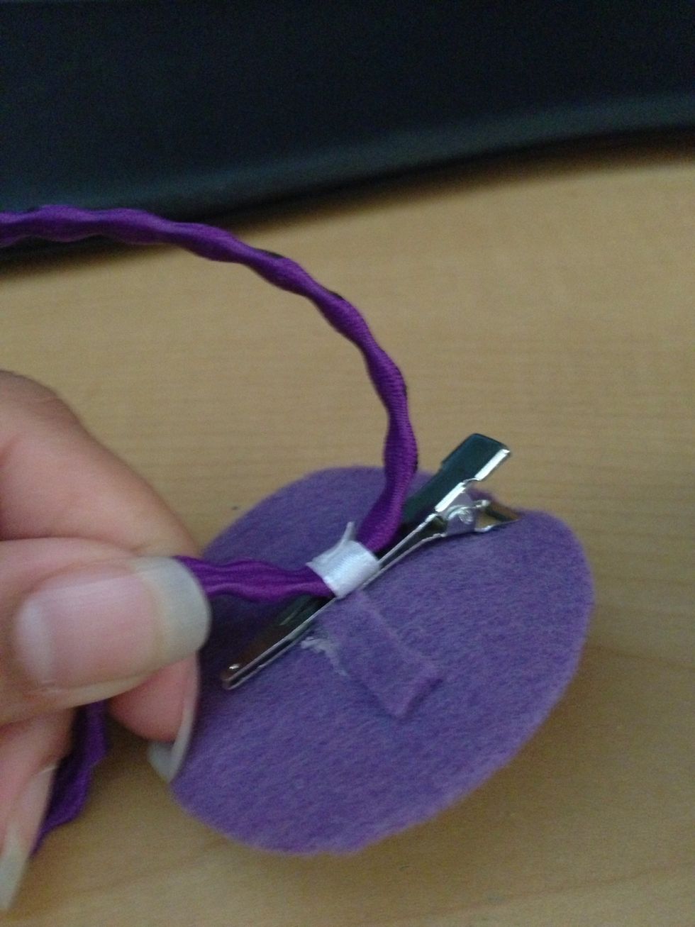 Now just place your hair clip in the loop that way you can always use the headband with different hair clips, the headband only or just the clip!
