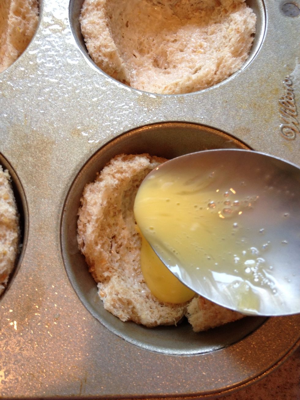 Now just spoon the egg mixture into the little bread cups- I used about 2 spoonfuls each