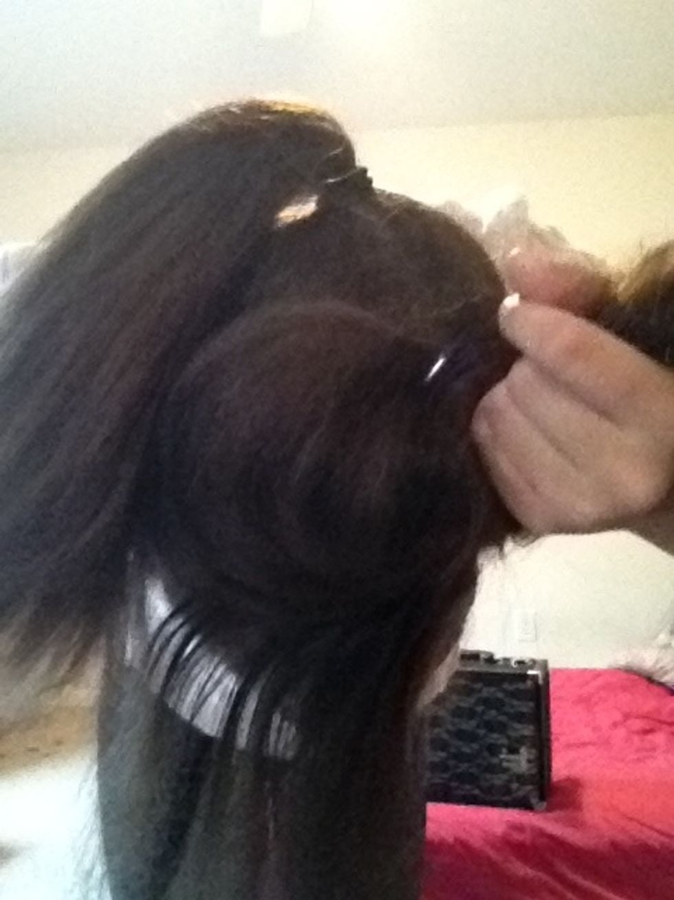 Now just wrap the two ponytails around one another