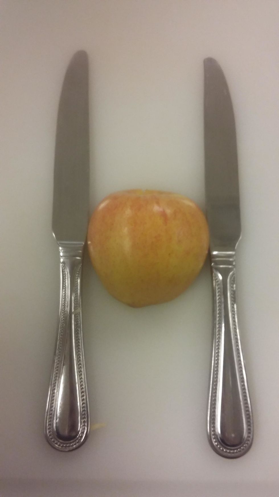 Now lay out the "nicest" side of the apple in your opinion like this