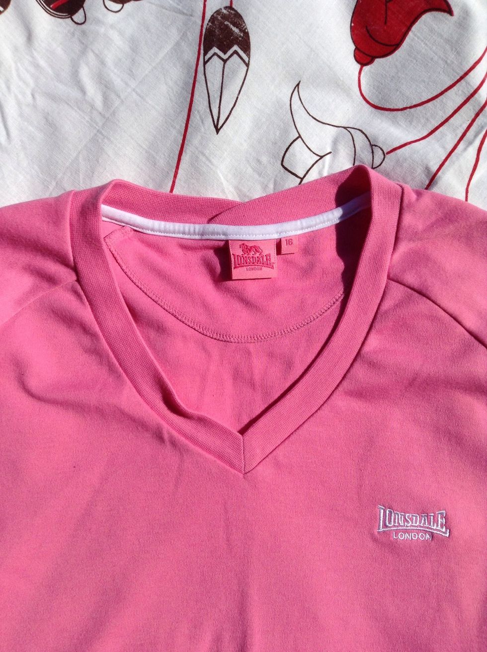 Now lay shirt flat and decide how you want to cut the neckline out. You can mark where you want to cut, or just eyeball it like I did.