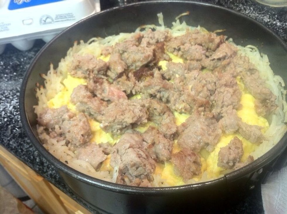 Now layer your slightly undercooked but nicely browned breakfast sausage right on top of the eggs.  Go ahead.  They won't get mad.