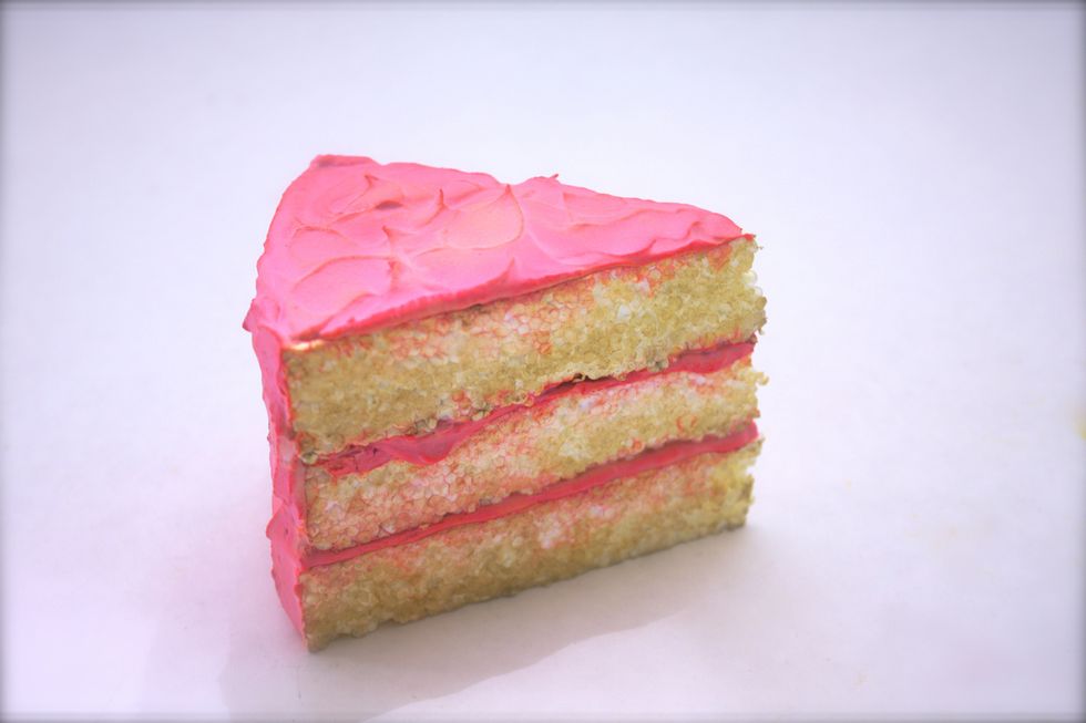 Now lessons learned! Color darkened up after it dried- color smeared onto cake parts- but... i think it kinda worked. I need to make sure I don't smear so much next time