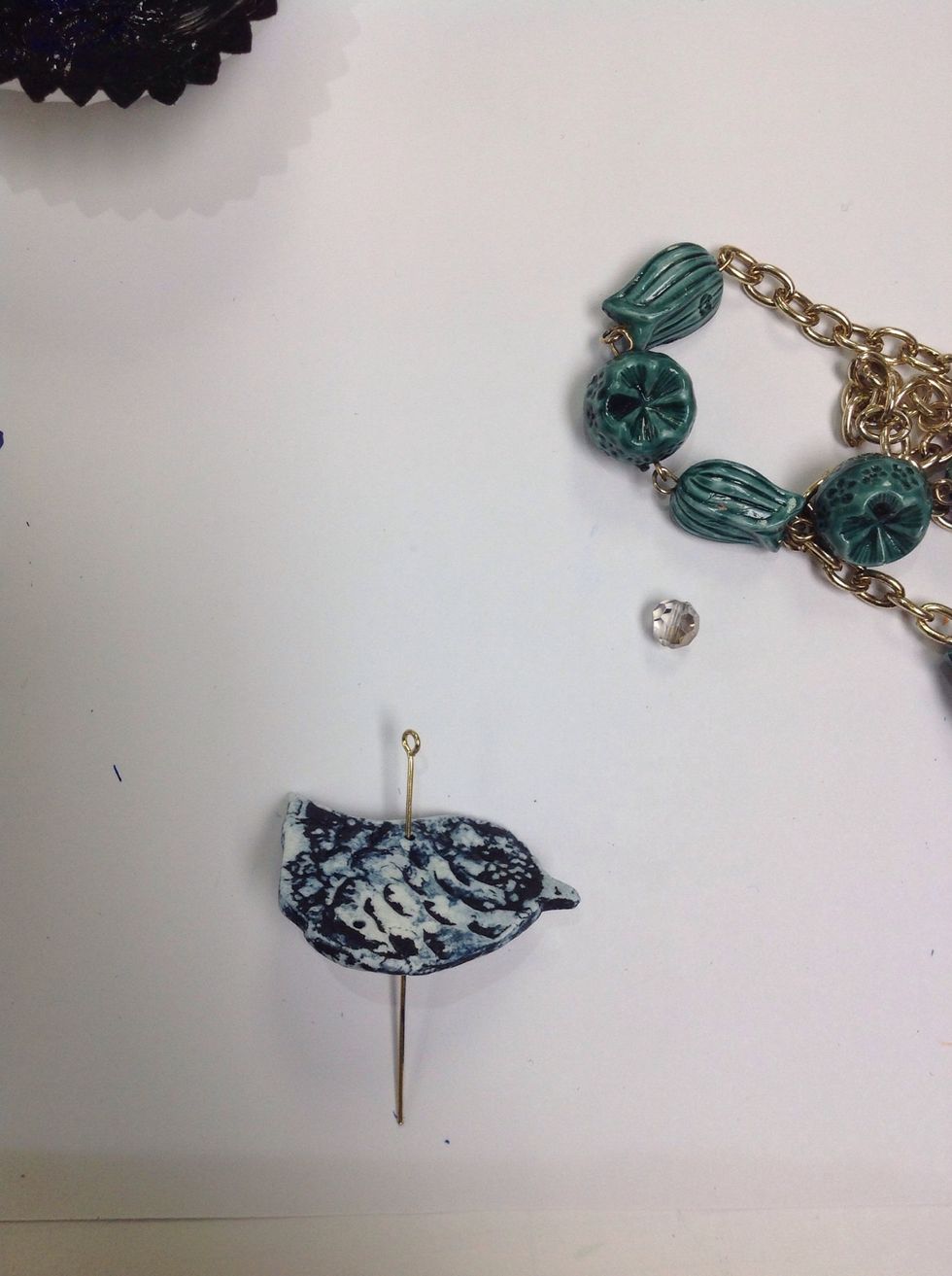 Now let's add some beads. Use some thin wire, or jewelry wire.