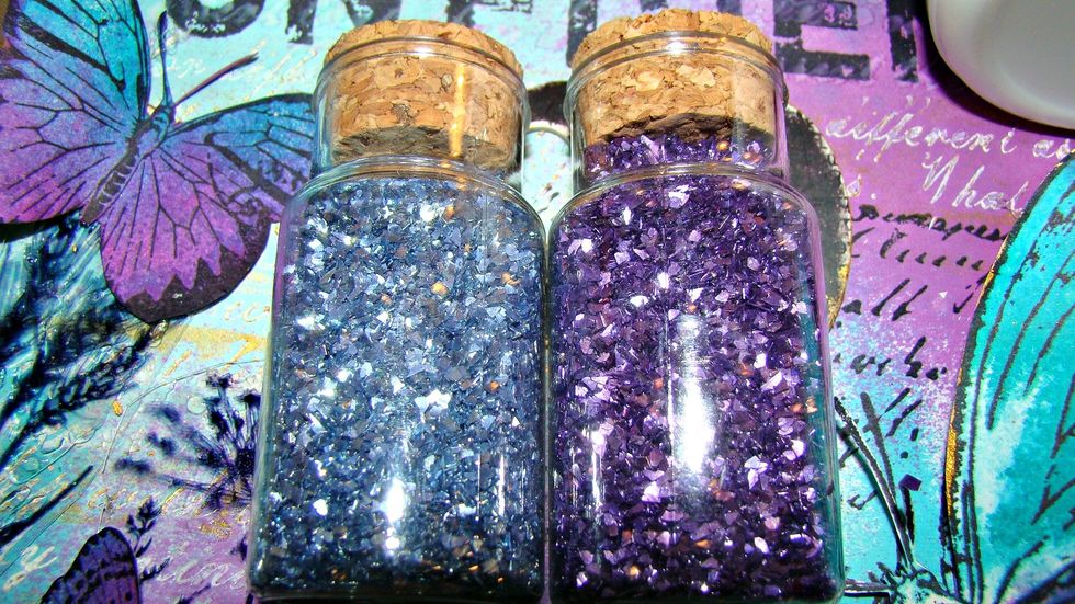 Now let's add some bling in coordinating colors, Using 3D Gloss Gel to adhere I added these pretty German Glass Glitters to the page.