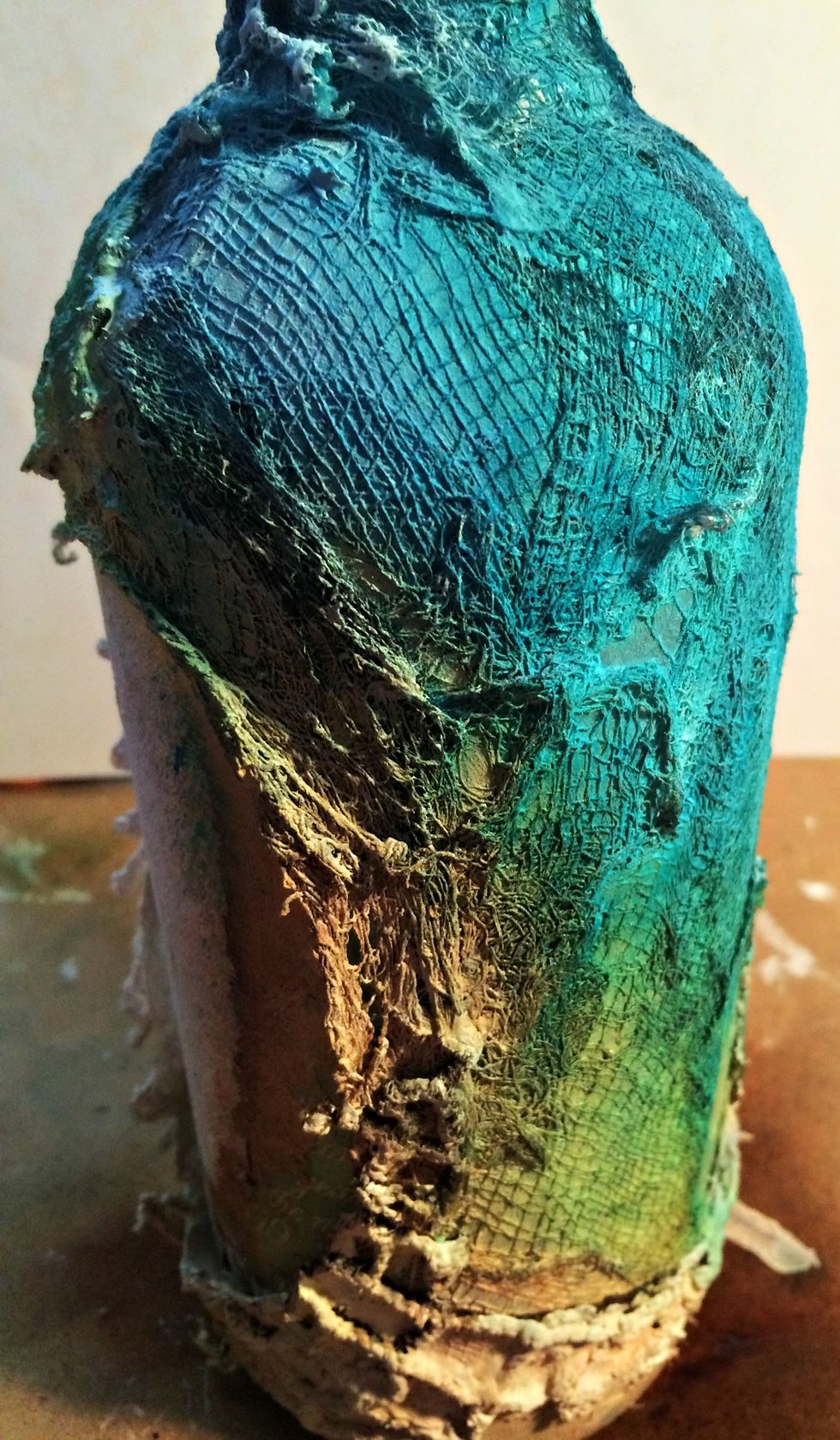 Now...let's add some gorgeous Art Anthology Color to this... I started with the greens. Misting Guacamole, Grass, and Fern Leaf around the bottle, but really concentrating around the opening area