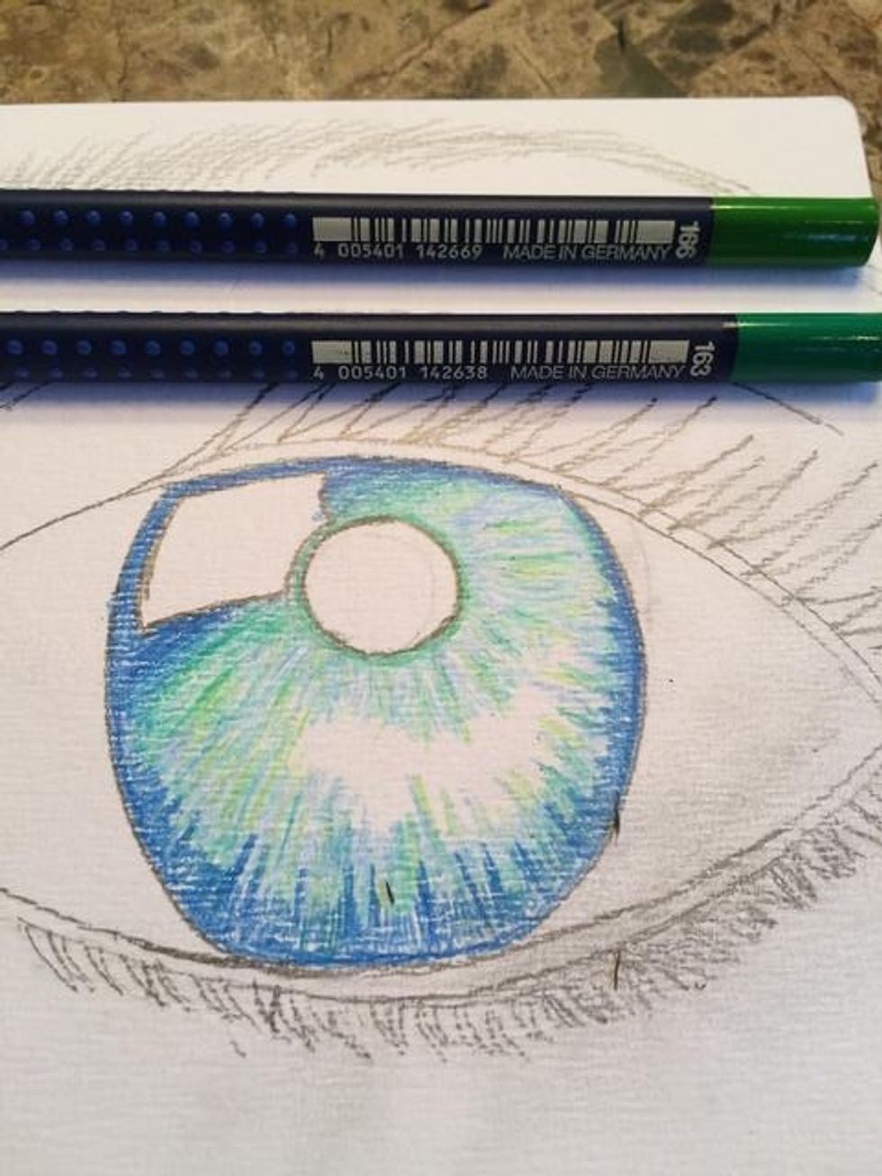 Now...let's add some greens! Using Art Grip (R) Aquarelle Watercolor Pencils #166 & #163, add lines of both greens throughout your blues.