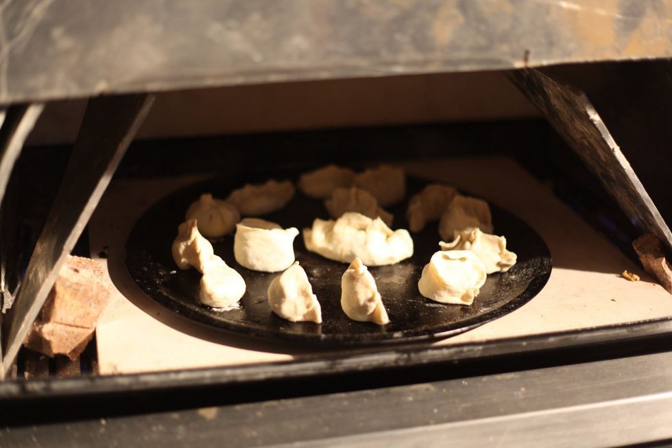 Now let's get back to the oven and check if Dad has burnt my dumplings. Lol