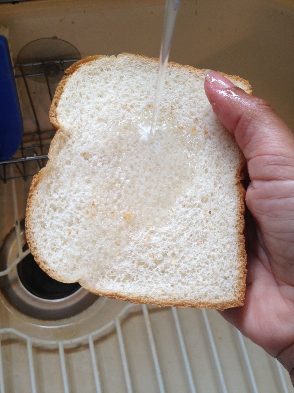 Now let's take the bread and soak it in some water.