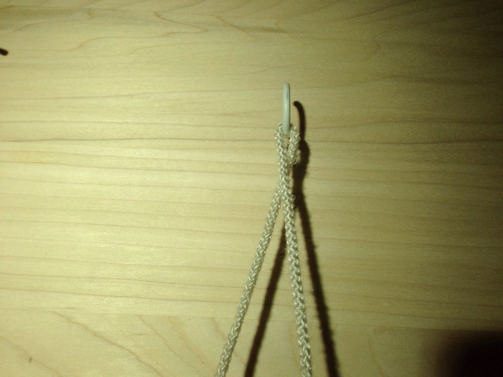 Now let's tie with your "throwing" hand holding the suture on the "bottom". Note that the suture is crossed by the hook. RULE: IF THE THROWING HAND HAS THE SUTURE ON BOTTOM, START WITH THE THUMB.