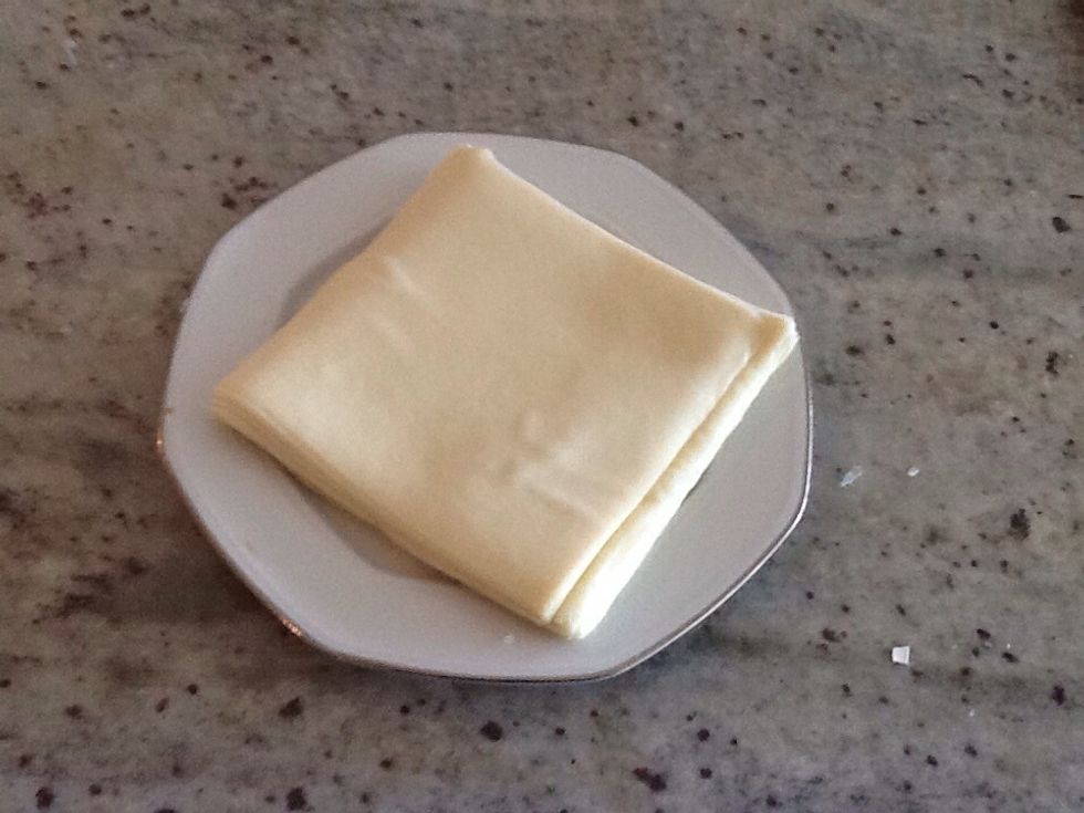 Now let your mixture rest on aside and take out your rice paper The normal rice paper you will have wet it on both side for it to become soft but with this rice paper you don't need too