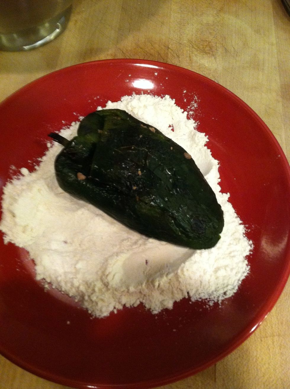 Now lets flour our chiles, carefully, you can add toothpicks to hold in place if u like.