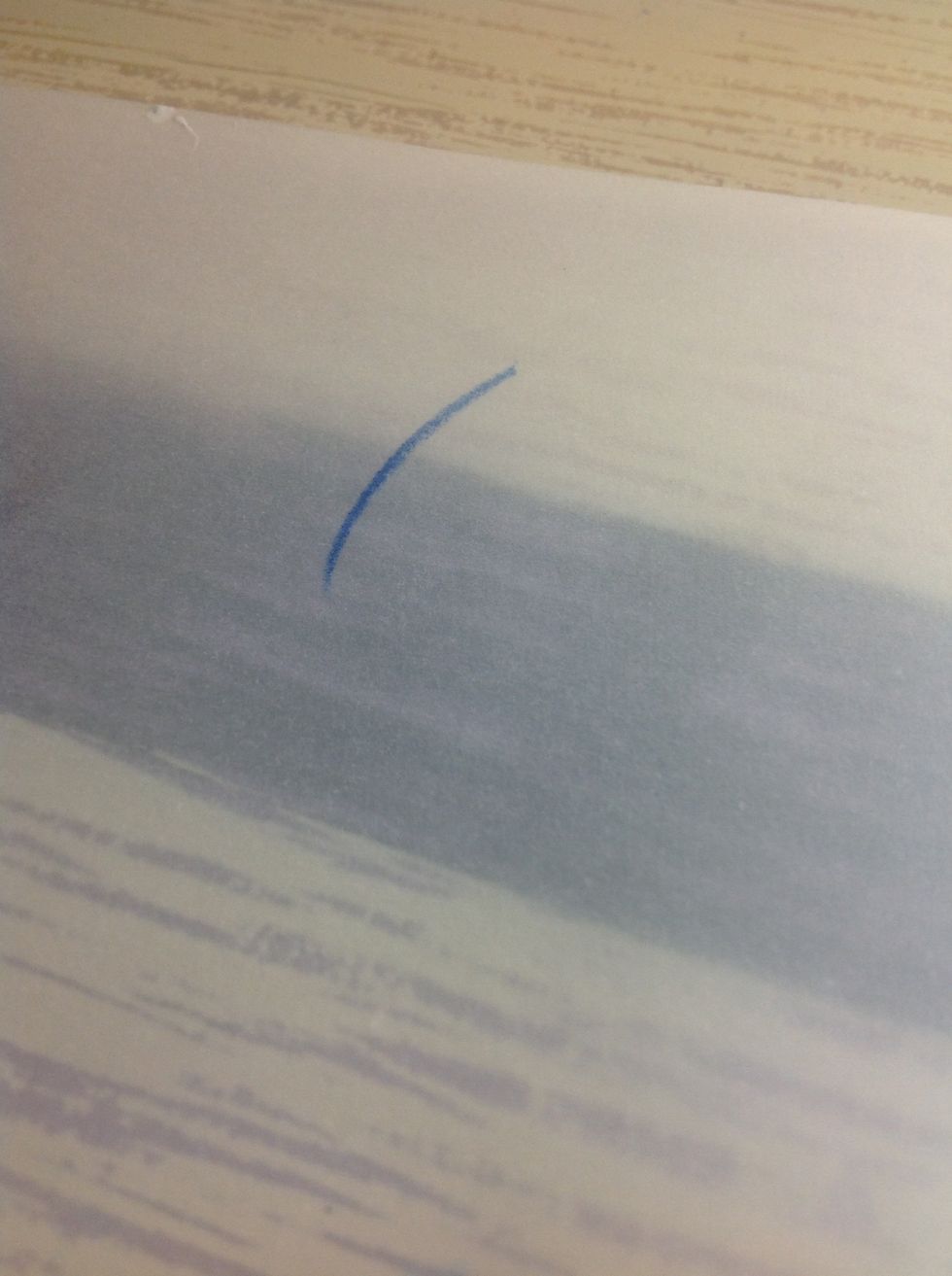 Now lets make a patterned feather. I'm starting off with a dark blue, draw the center line.