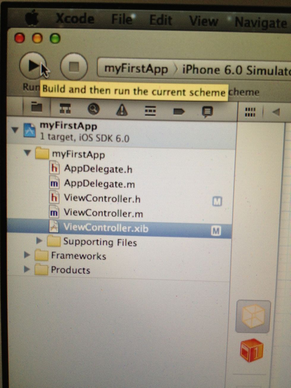 Now lets see what we have done in the iPhone Simulator. For that, just press on the big play button on top left of XCode. Then wait until you see the simulated iPhone on your Mac