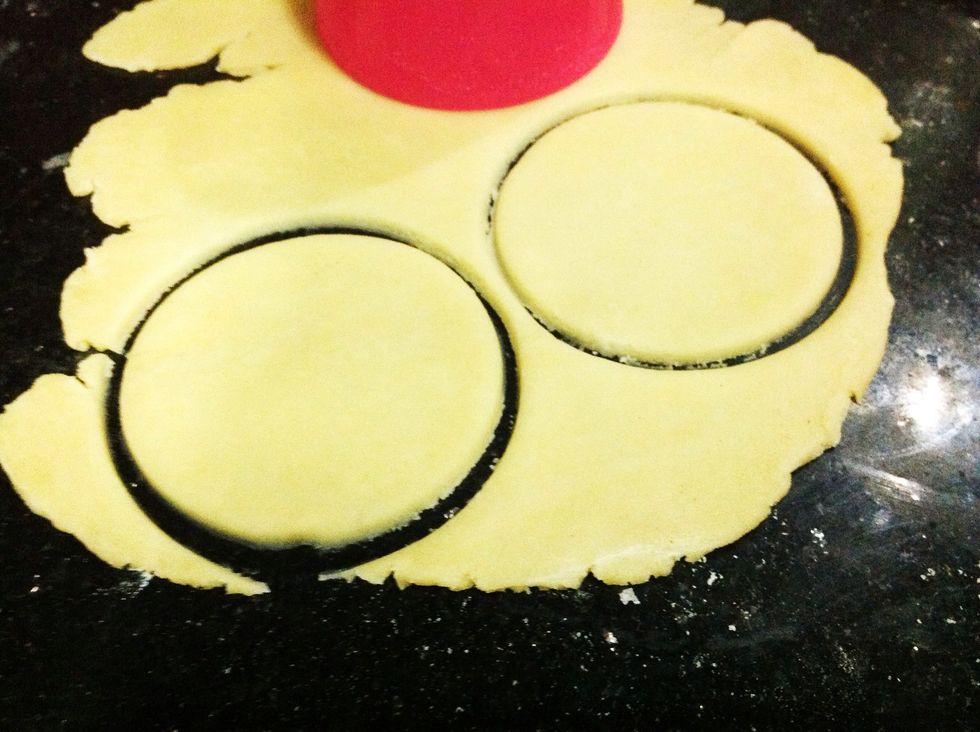 Now lets work on the pie crust. Just roll it out and cut out rounds using 3-inch cookie cutter. I didn't have a round cookie cutter, so I just used a cup \ud83d\ude14 you should get 8 disks.