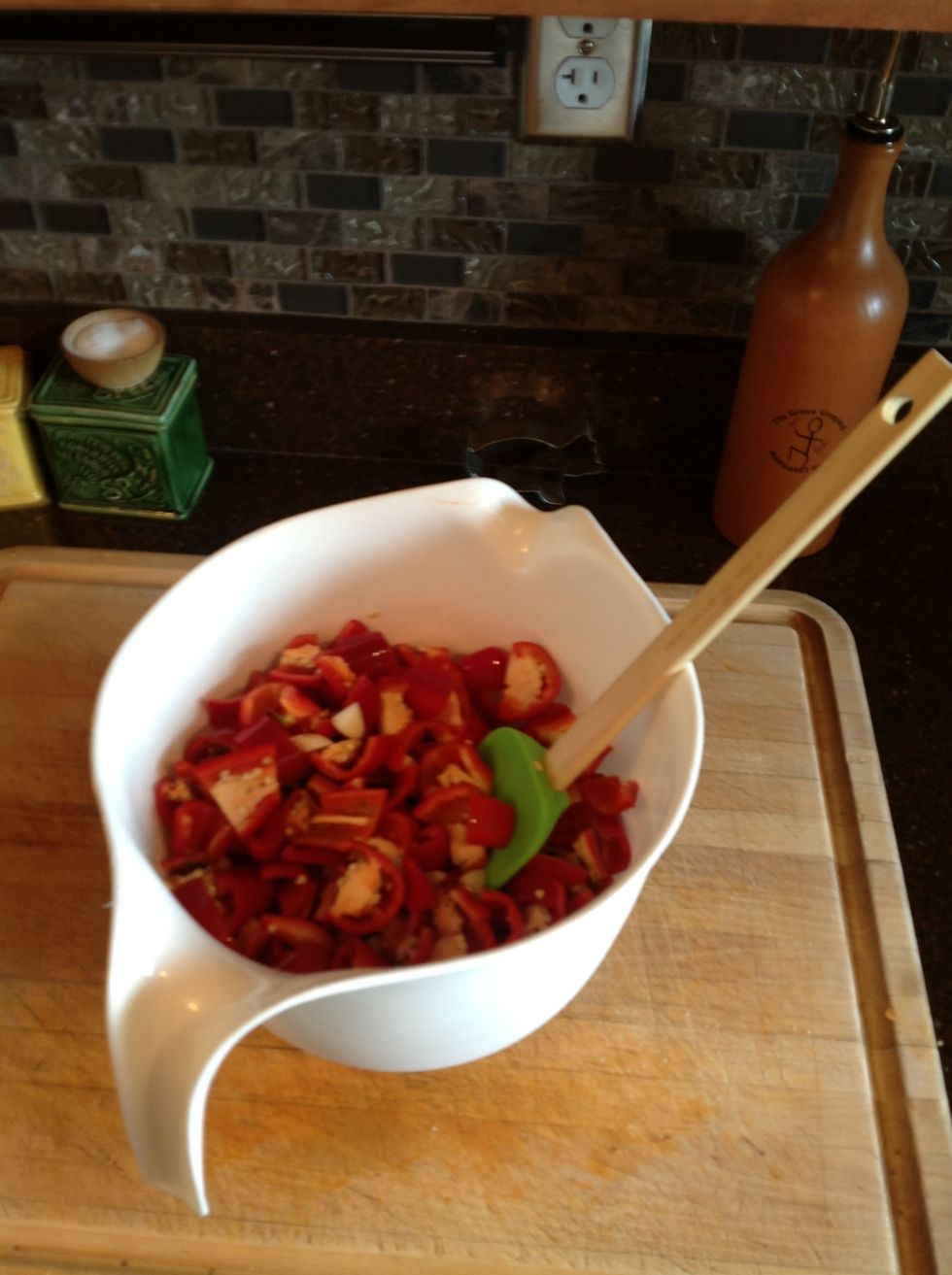 Now lightly toss ingredients and let set overnight. This will mellow the heat of the peppers and let them get to know each other ;)