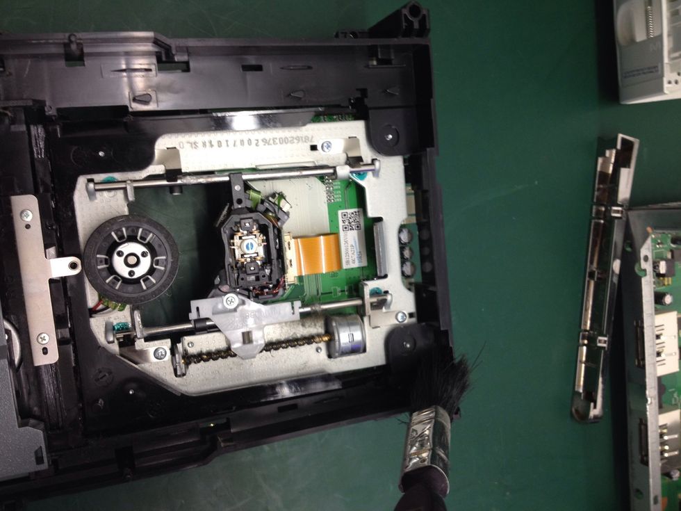 Now locate any more dust and brush it away.