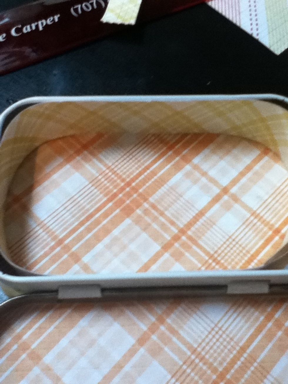 Now loosely fit the strip inside the bottom of your tin. If it is too tall, trim it down slightly.