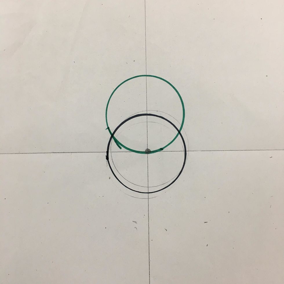Now make a 2nd circle above the 1st circle. Use another color marker. Line the bottom of cup with the dot.