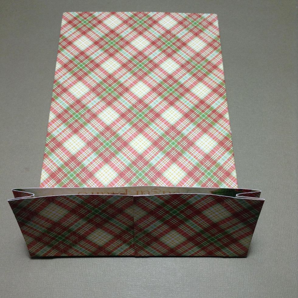 Now, make a fold in the bottom of approx. 2''. Take the edge and fold up, make sure to fold it well.