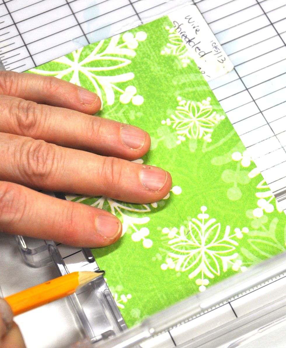 Now make a pencil mark on each piece at the four inch point top and bottom of each piece.