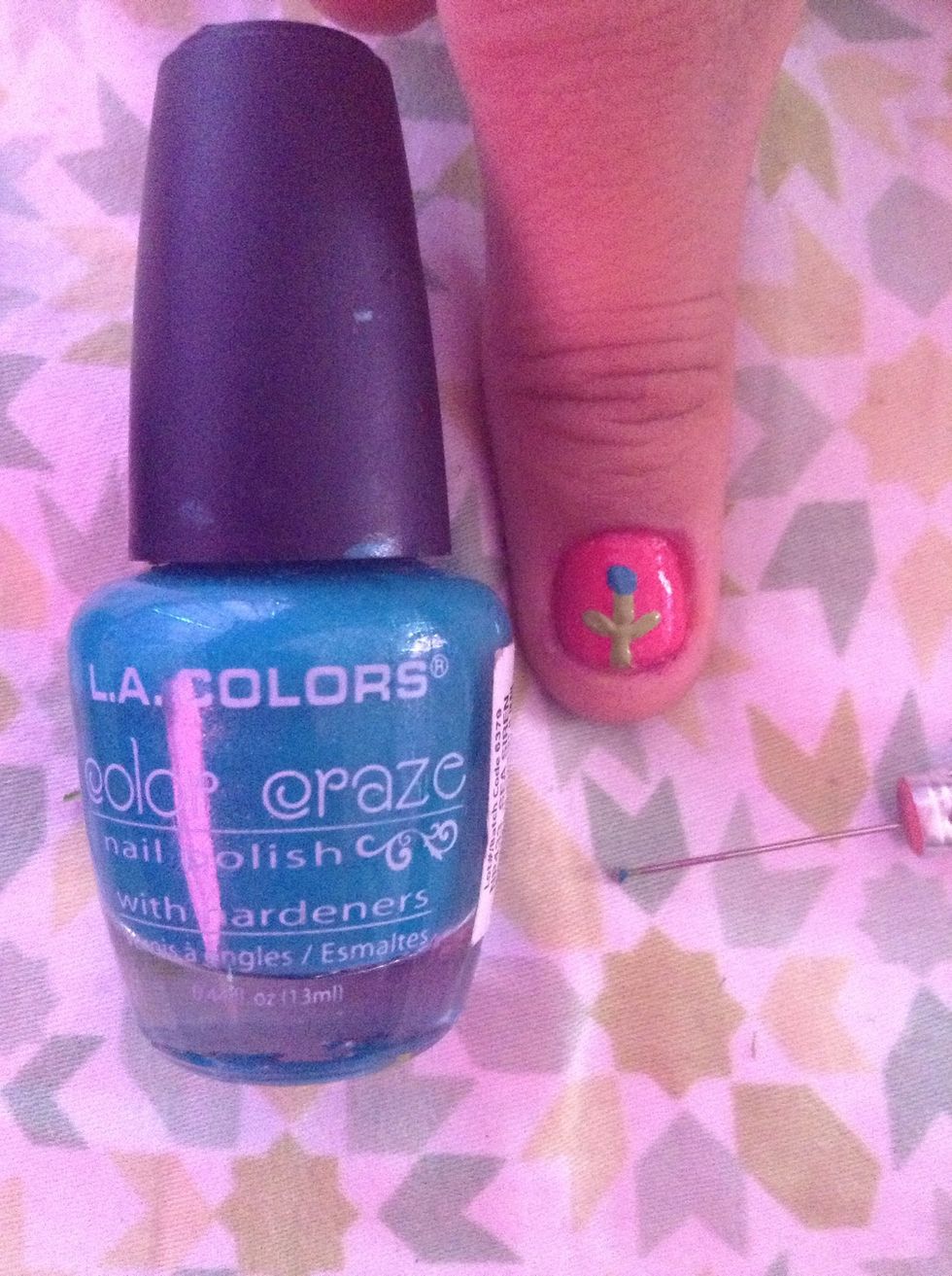 Now make a small dot on the top of your stem