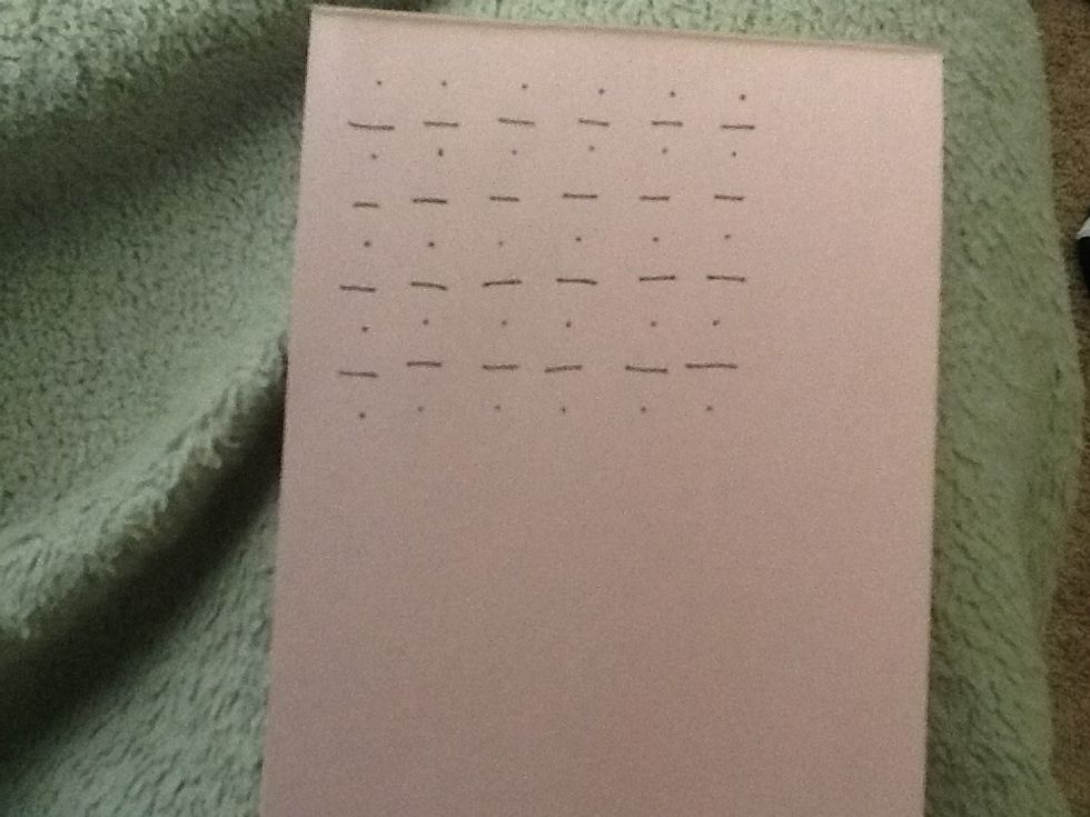 Now make lines between the dots but leave a small gap between each line. It should look like a division sign.