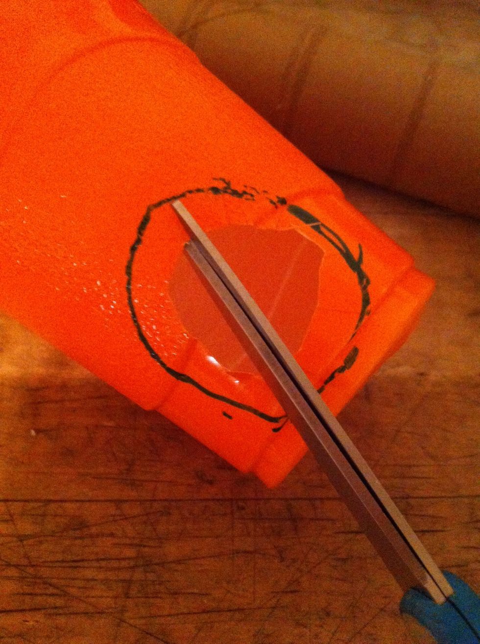 Now make little slits from the cut hole to the drawn circle