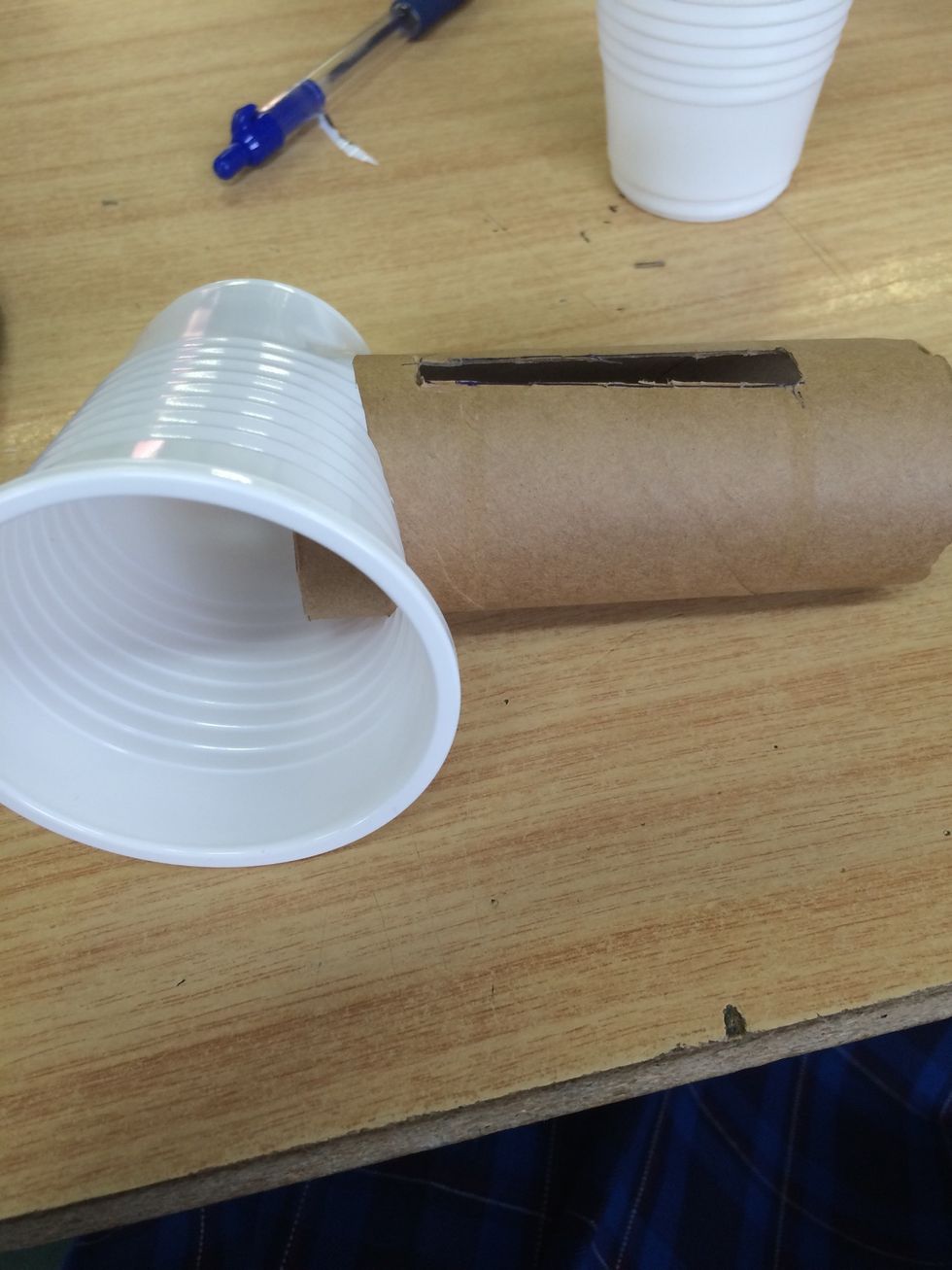 Now make sure the toilet paper roll fits inside the cup, if so move the cup around where you like it and stands correctly (repeat on other side).