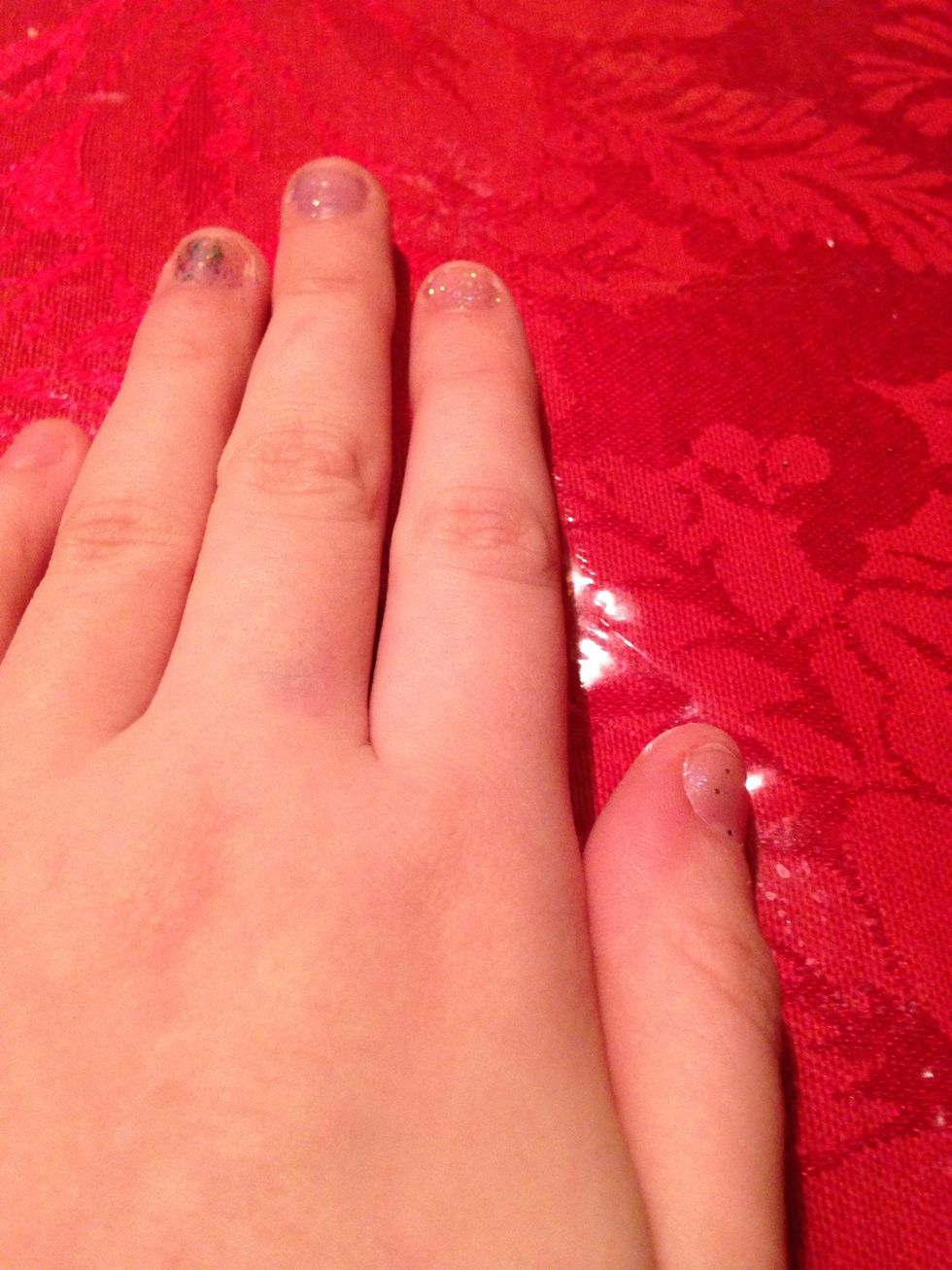 Now make sure your nails are dry. They HAVE TO or else you will make a mistake (self experience)