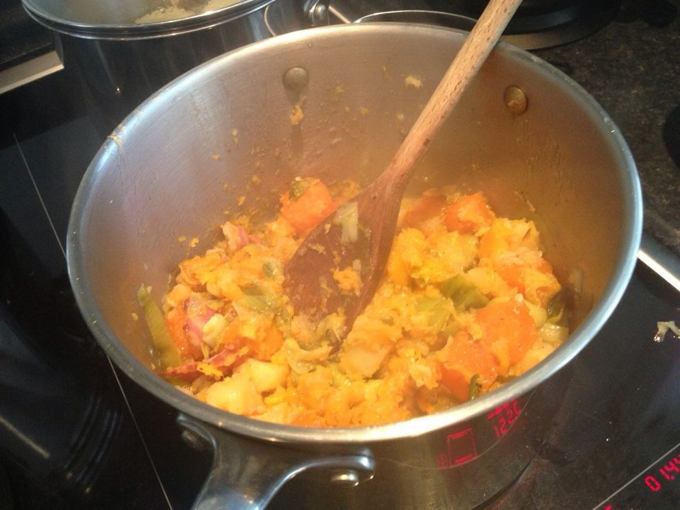 Now mash all of the veg trivet up into a pulp whilst adding the flour, then stir in whilst on a medium heat