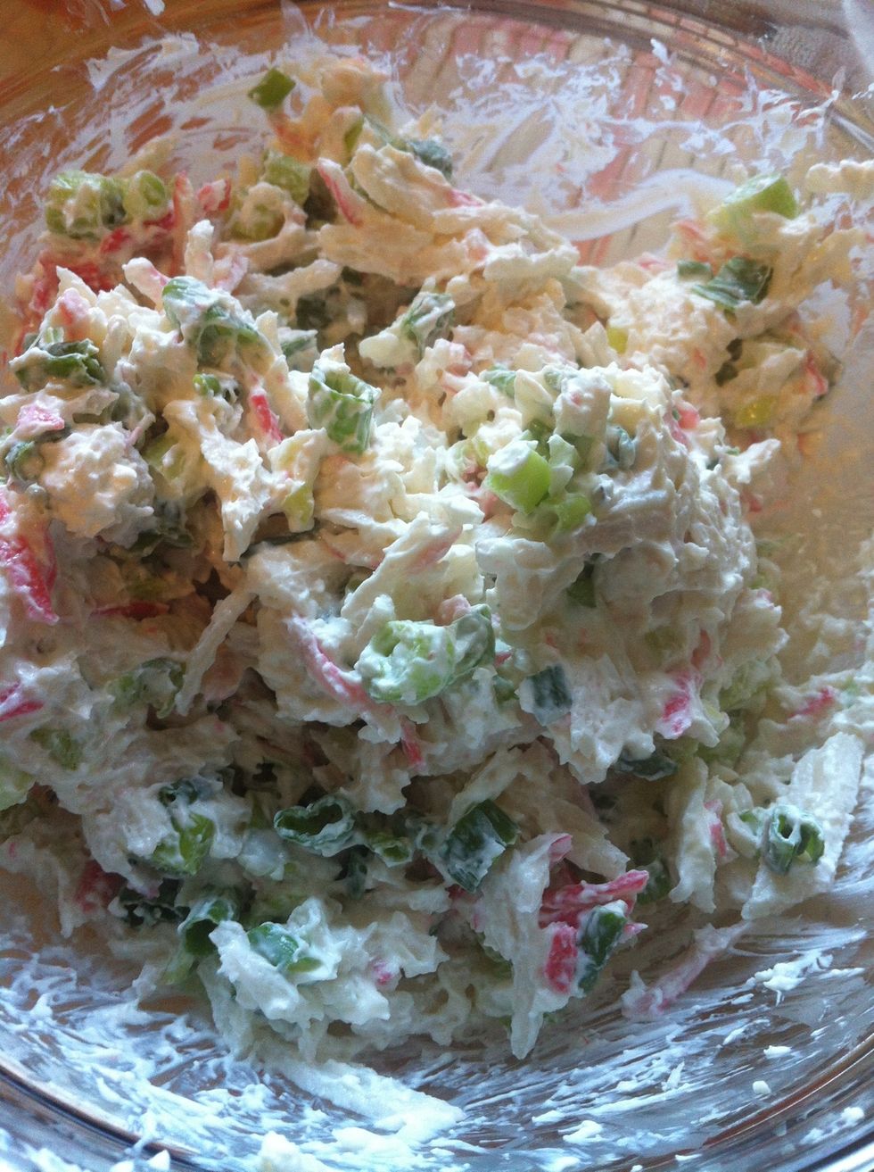 now mash everything up! \ud83d\ude0b and make sure everything is coated with the cream cheese. btw portions are up to you, you dont have to use imitation crab either if you dont want to.