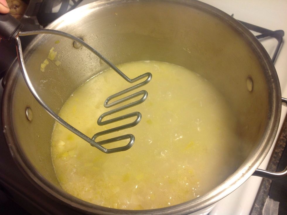 Now mash the potatoes while there still in the pot or you can run it through a blender however this will pur\u00e9e your soup.