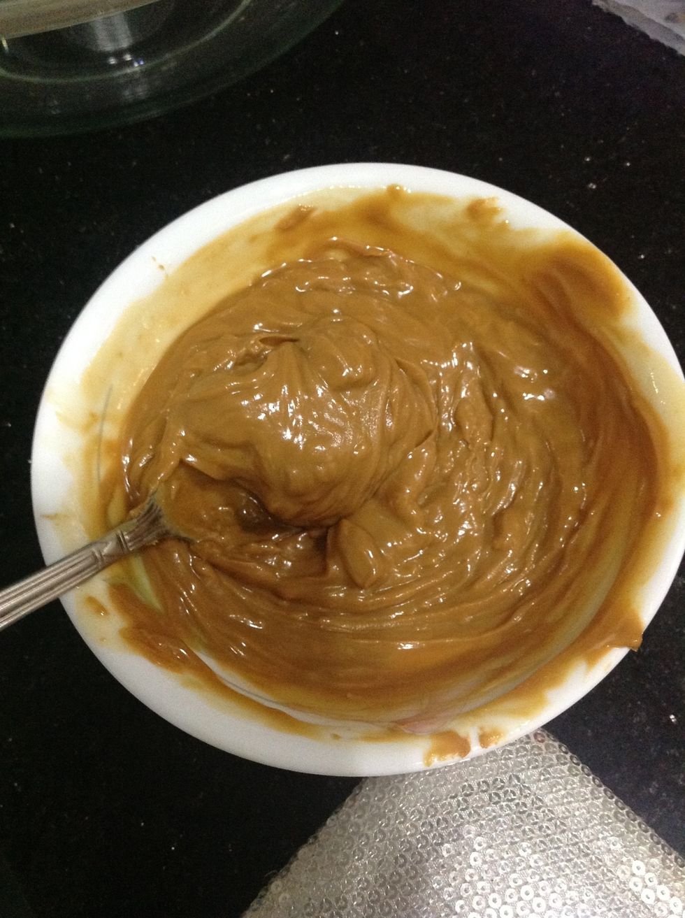 Now mix it up well. If it gets a little tough to mix, pop it in the microwave for 15 seconds. Make sure you don't melt the butter, just making it slightly soft. By then the PB would be looser too.