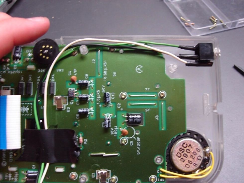 Now mount the jack in the gameboy case. Put the end of jack into the hole you drilled from inside the case.