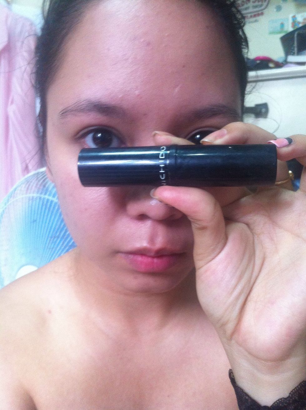 Now moving to concealer we need to hide some things in our face and I use a little beige shade for conturing my face.