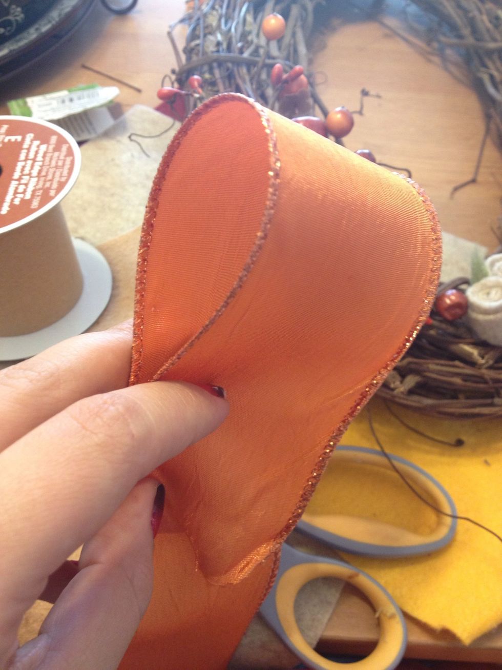 Now my "I don't know how to make a bow" bow. I just wing it but I do multiple loops and glue them together in the center...