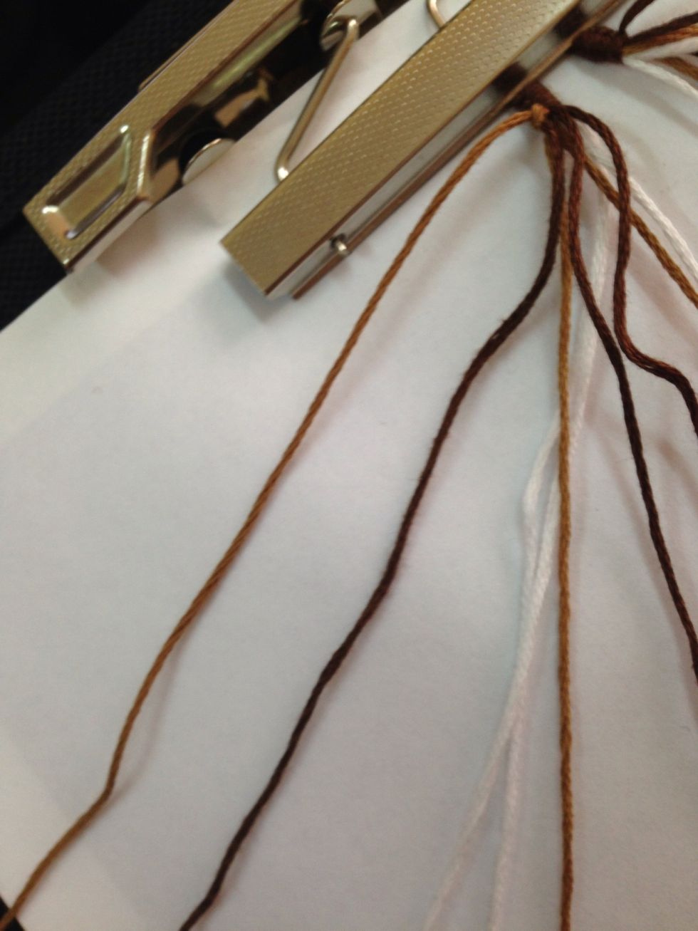 Now notice that because we tied from right to left, the light brown string that started on the right moved over to the left and it stays there till we tie it again!