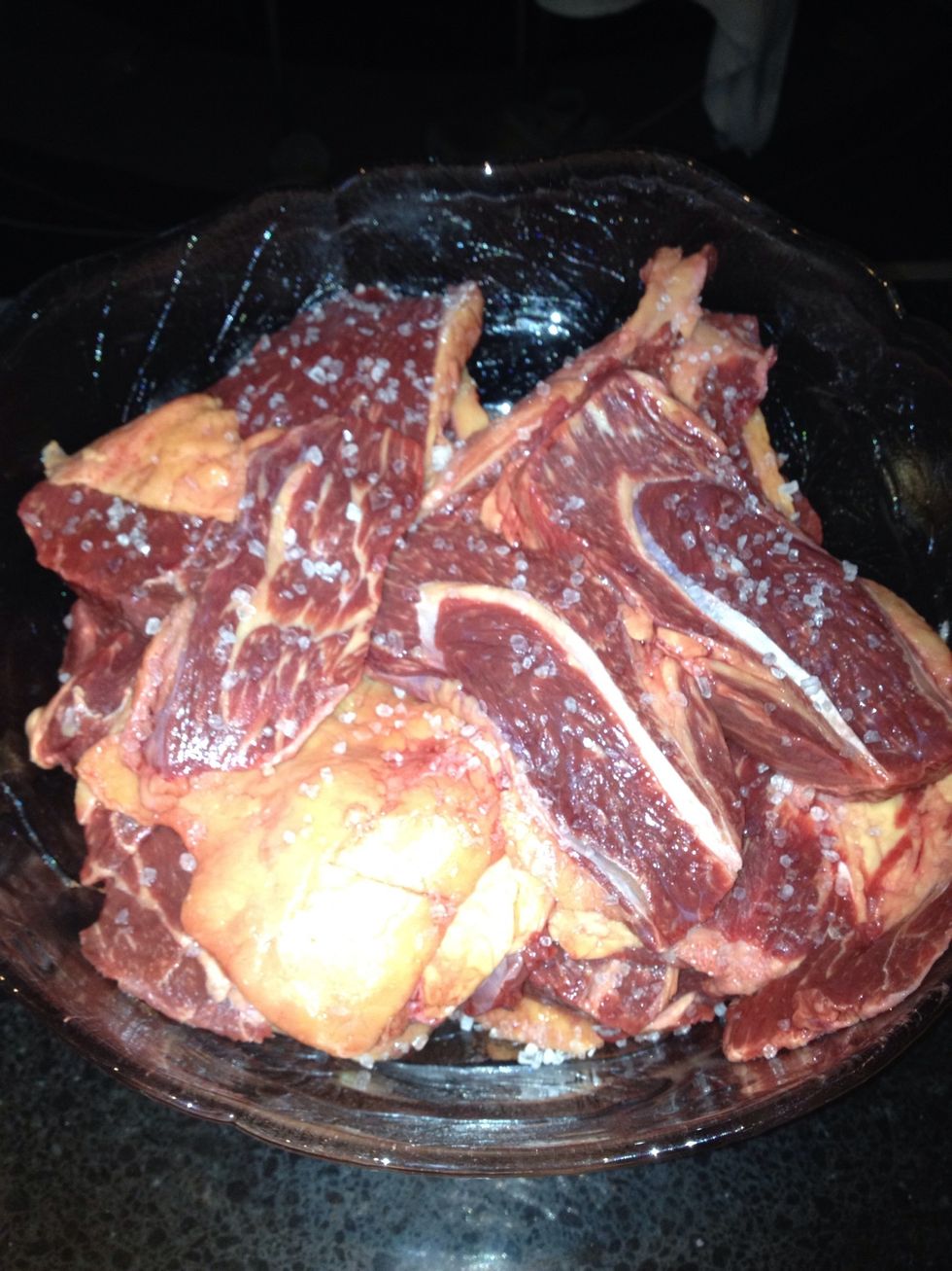 Now now sprinkle a little rock salt in a glass or plastic dish then layer your beef putting rock salt between every layer less here is more as it will sit for an hour