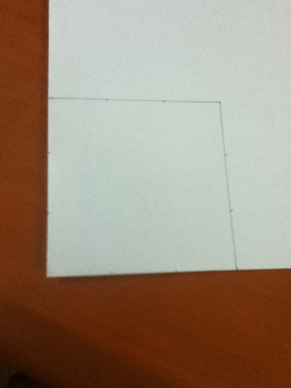 Now on the corner of you fold make a 6x6 square .Then make 3 marks of 2 centimeters each one and attach them.