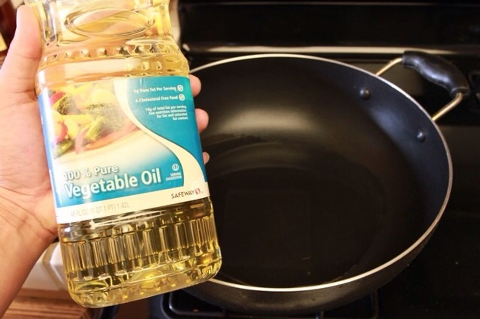 Now on to cooking of the eggplants. Heat up your pan and add the cooking oil. Just add enough to coat the bottom of the pan.