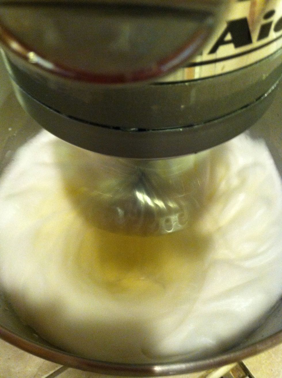 Now one by one add your egg yolks.