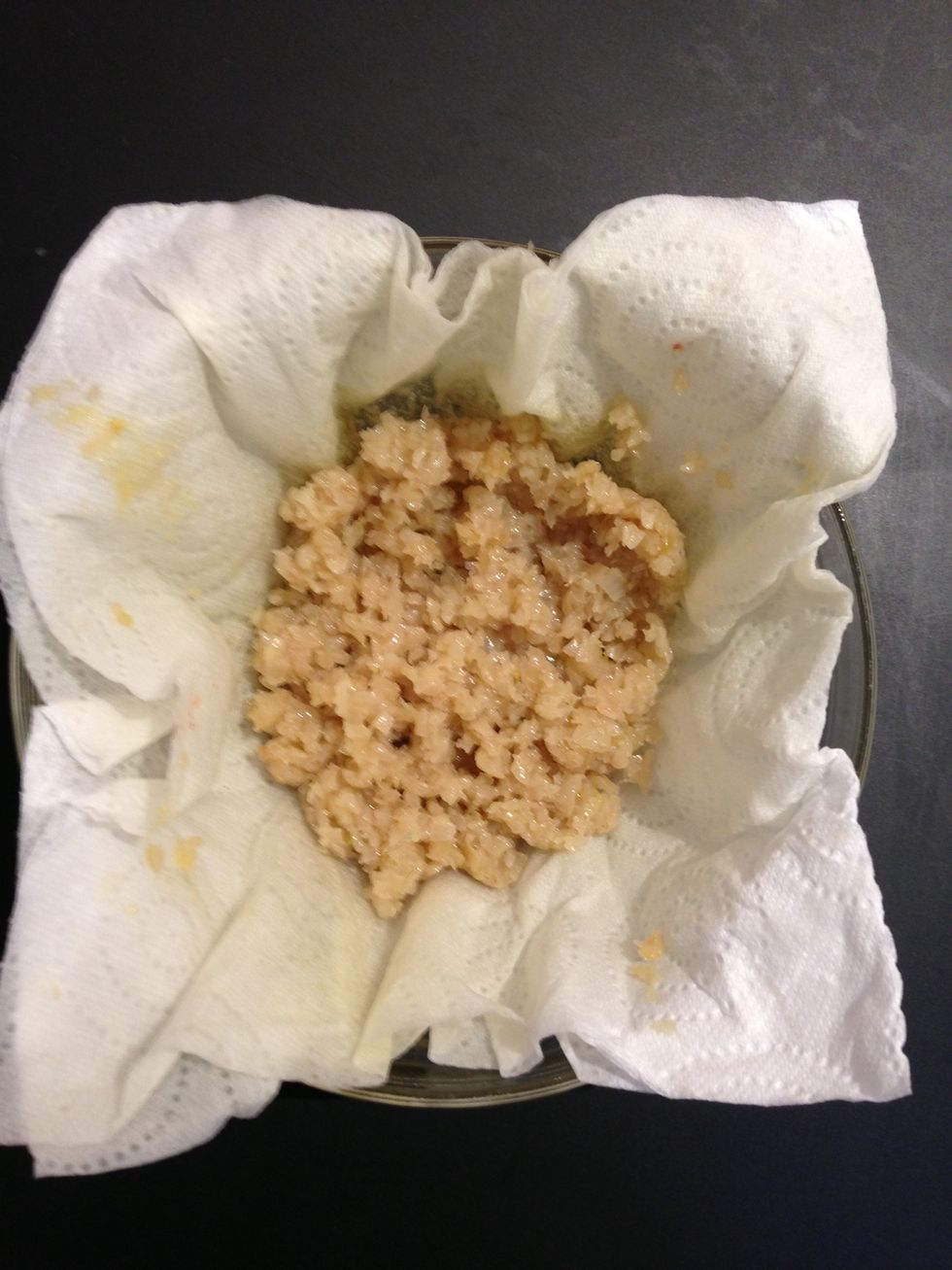 Now onions are cooked light Brownish. Take them out and put them on a kitchen paper to take out the extra oil