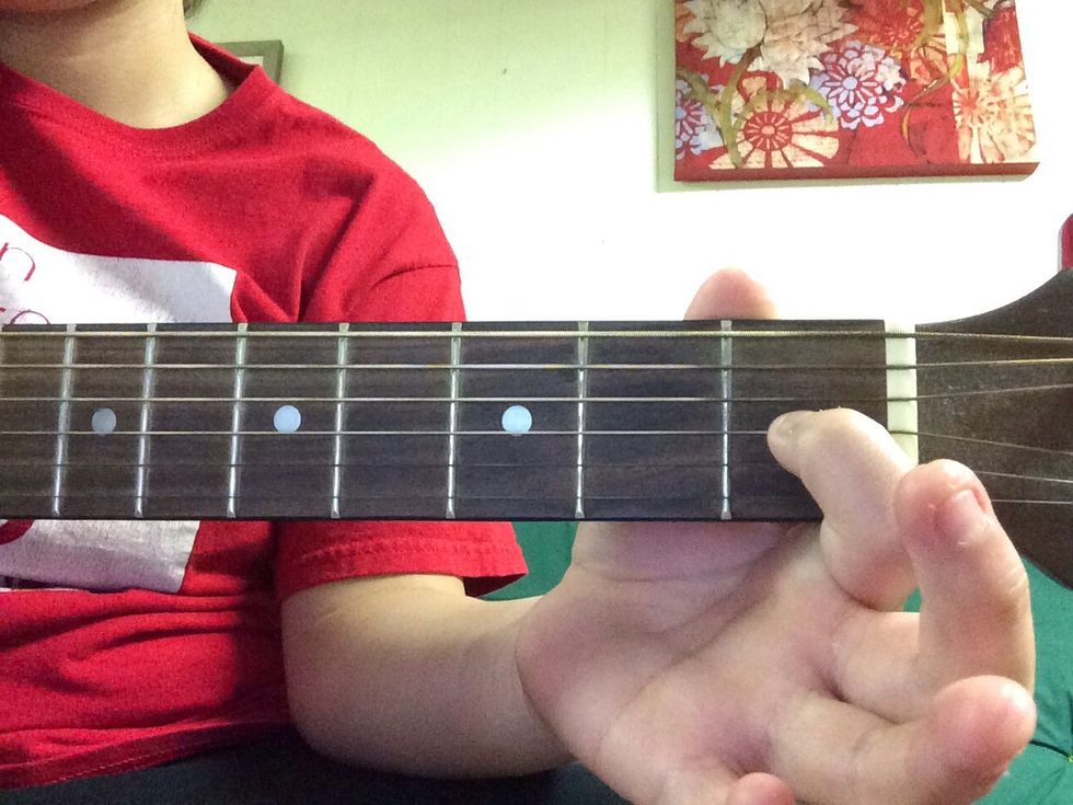 Now onto E major. Place your first finger on the G string on the first fret.