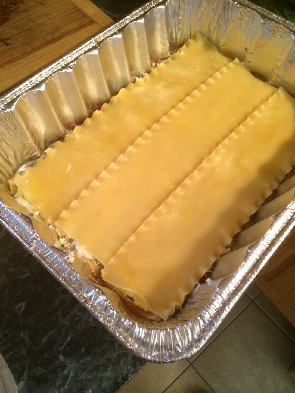 Now onto the next layer, add three noodles to the top