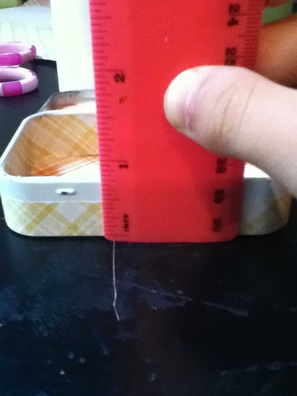 Now open the lid, and take the measurement shown.